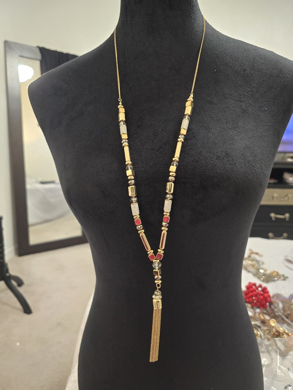The Limited Gold-Tone Long Beaded Necklace with Gold And Silver Tones.